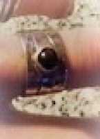 gallery/puzzle ring with stone $50